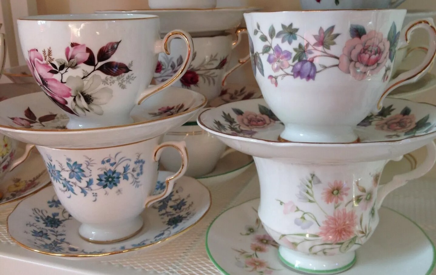 Antique tea cups with saucers