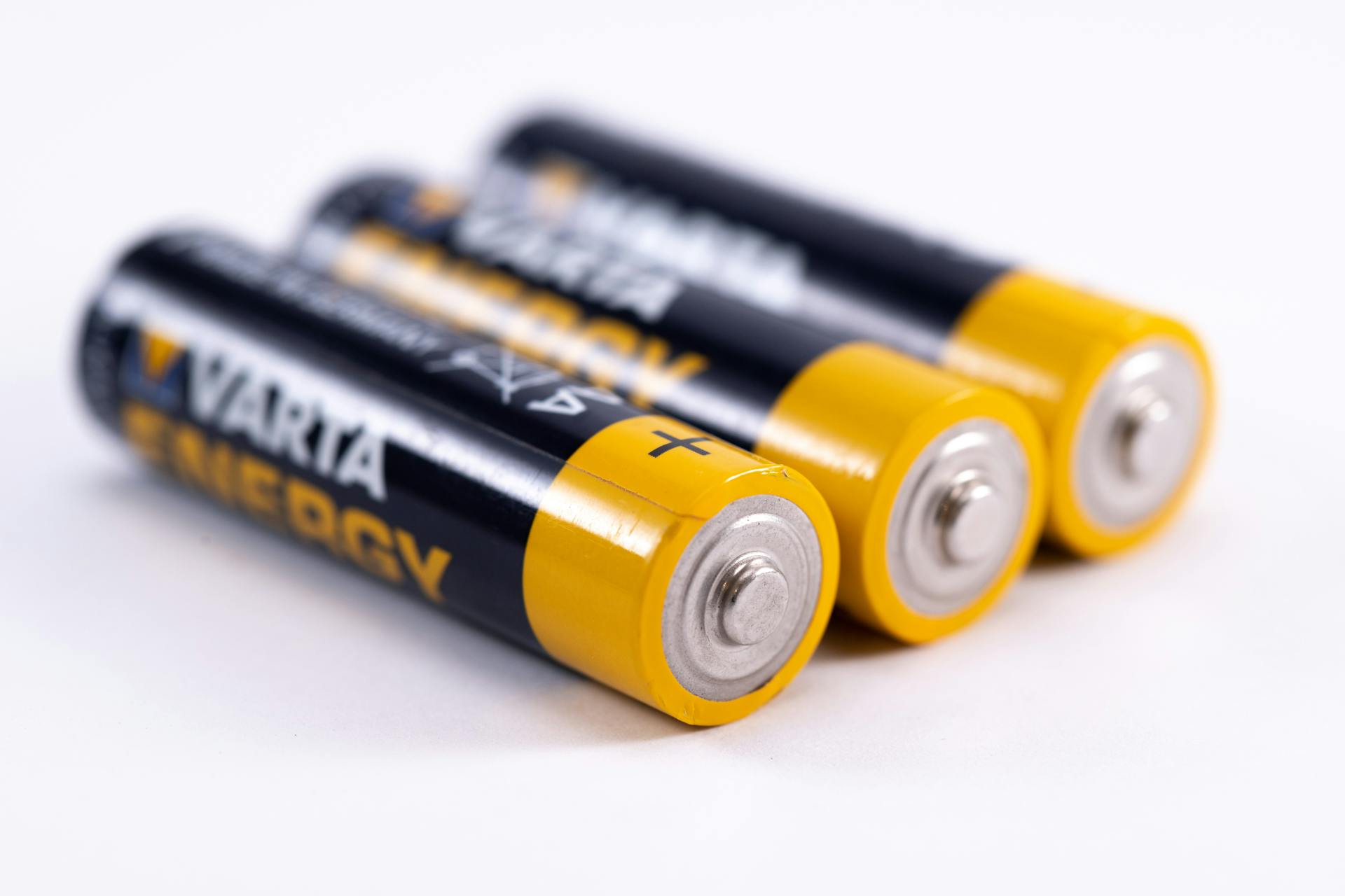 Close-Up Shot of Black and Yellow Battery