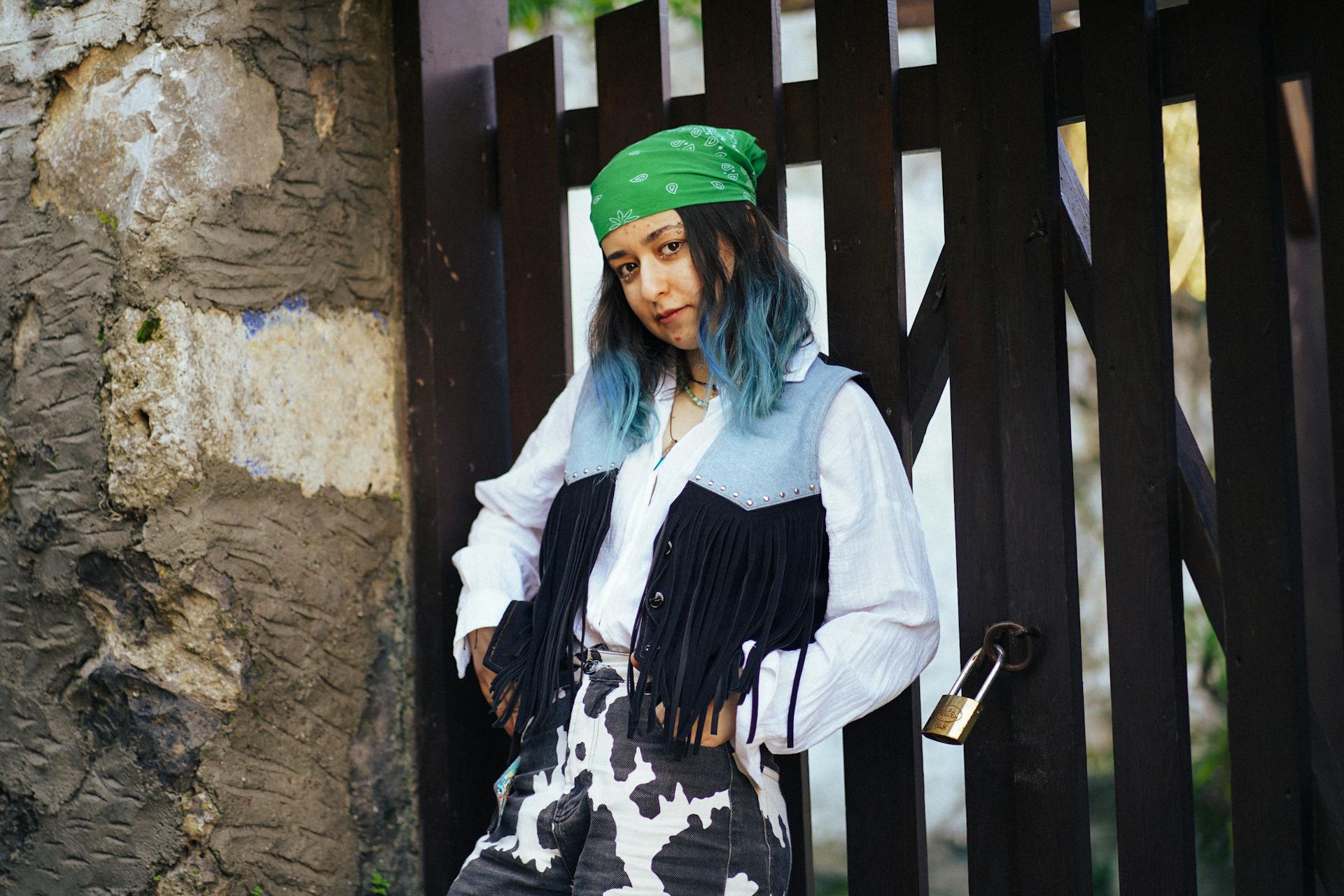 Fashionable Woman in Cow Print Pants Outdoors