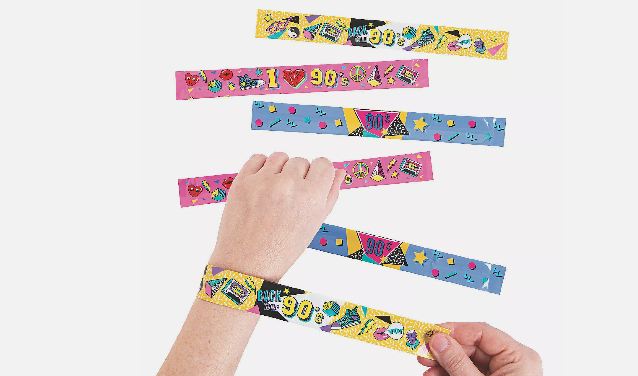 Colorful 90s-themed slap bracelets with neon designs, including patterns like boomboxes, peace signs, cassette tapes, lightning bolts