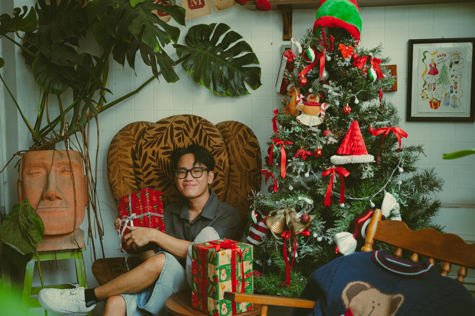 A joyful indoor Christmas scene with gifts and decorations in Ho Chi Minh City.