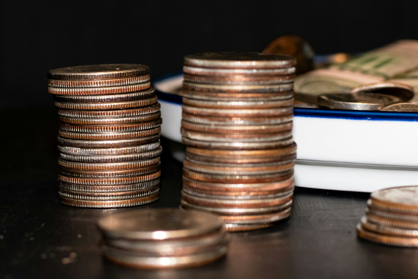 a pile of coins sitting on top of a table