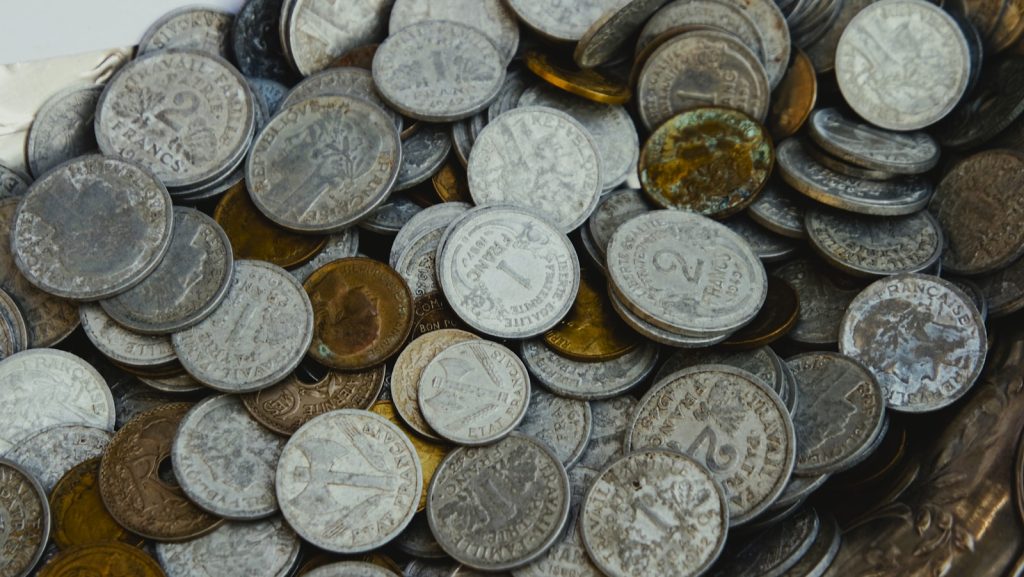 A pile of old, tarnished coins