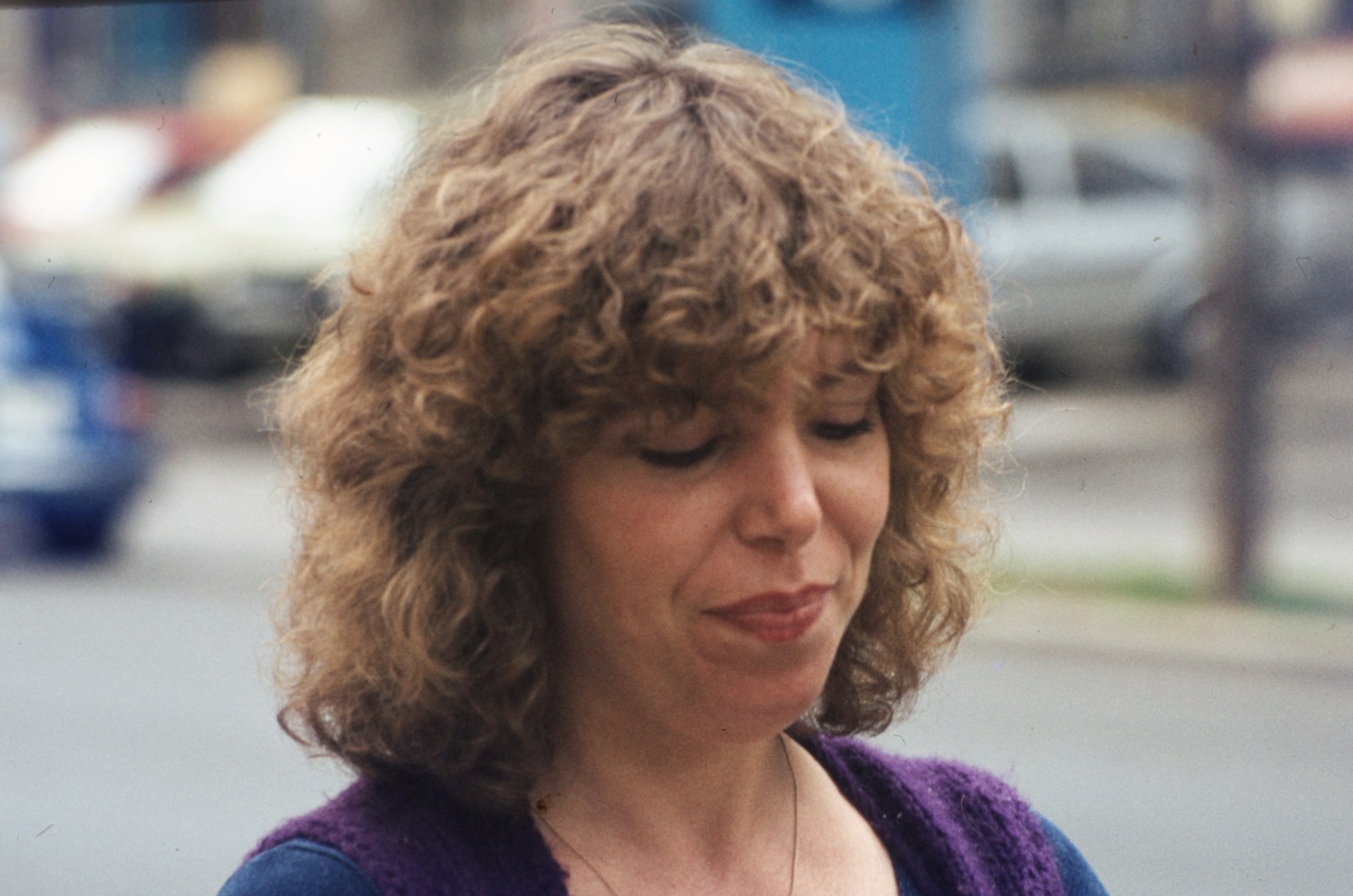 woman in purple v neck shirt