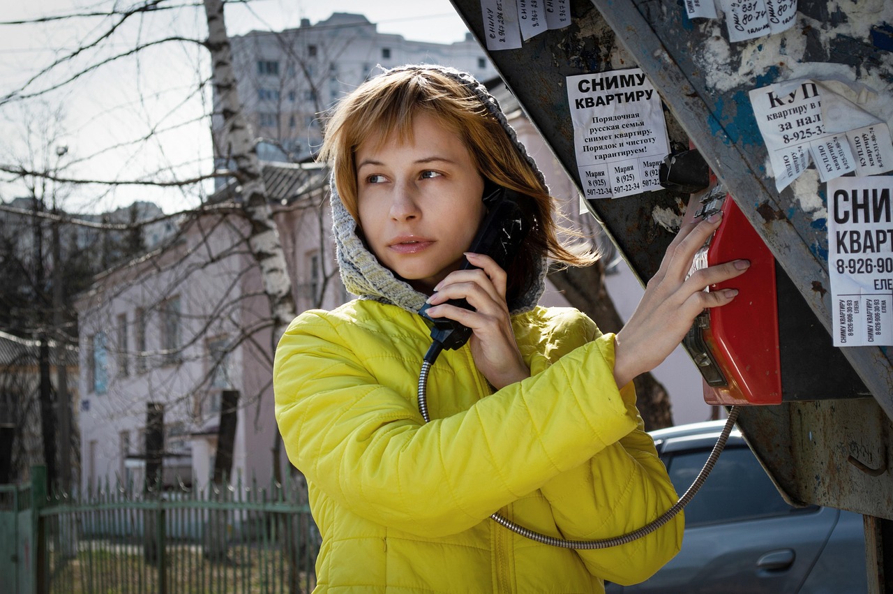 woman, call, phone booth, payphone, landline telephone, street, city, road, winter, communication