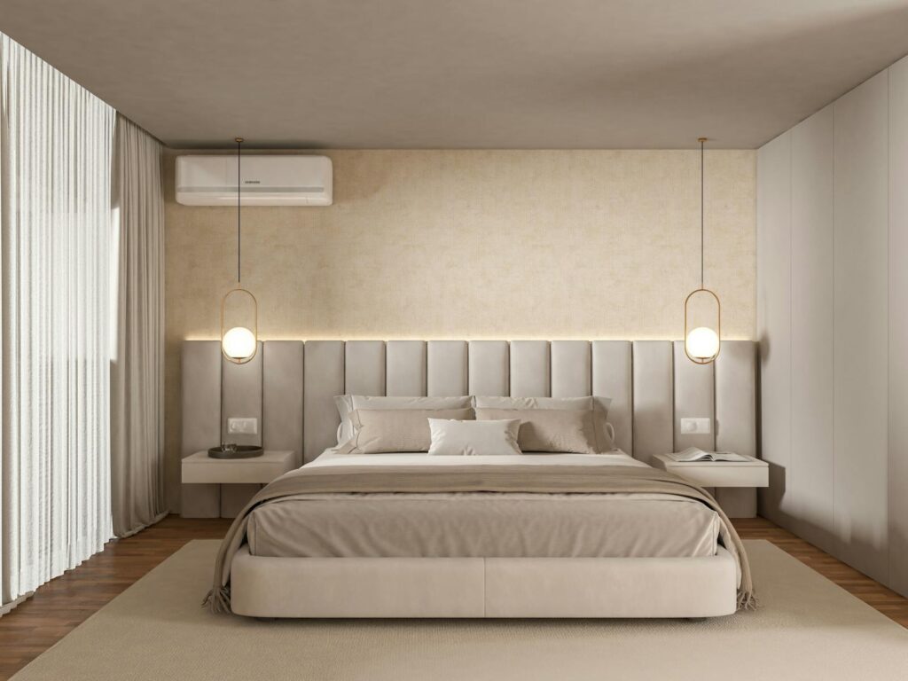 Spacious bedroom with modern minimalist design and cozy ambience.