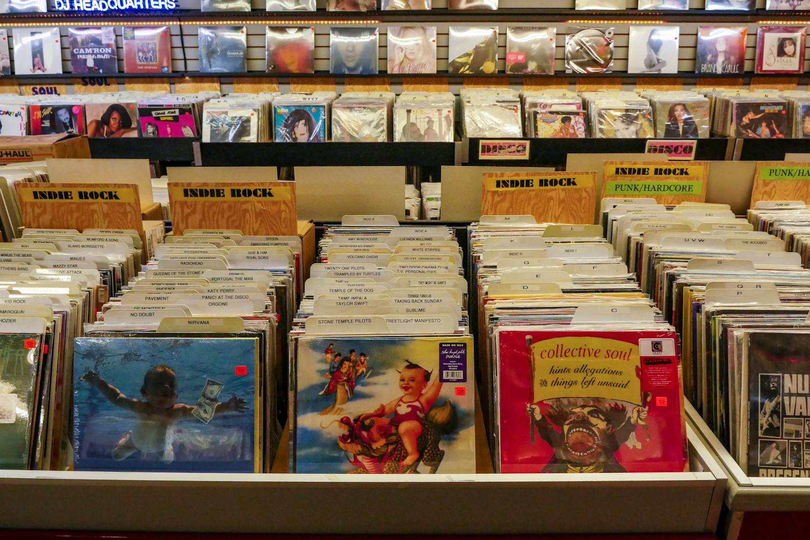 Explore a classic collection of vinyl records in a retro music store setting.