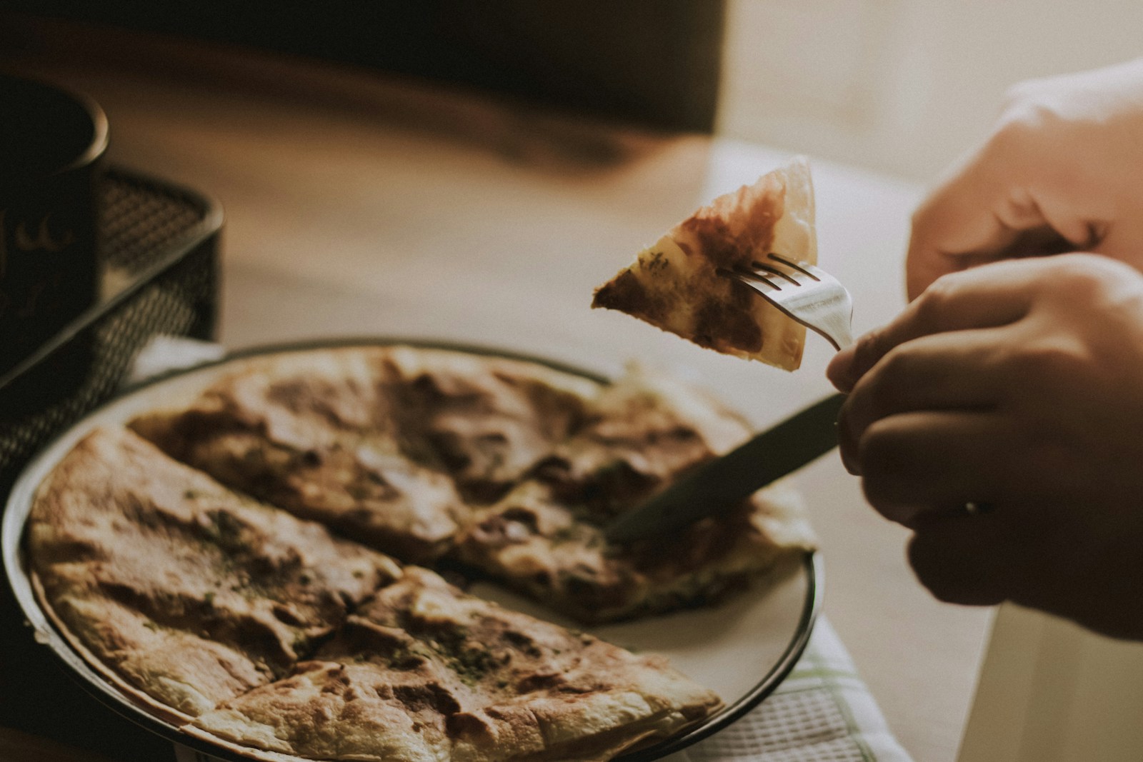 An Etiquette Expert Says Most People Eat Pizza the Wrong Way and The Debate is Getting Heated