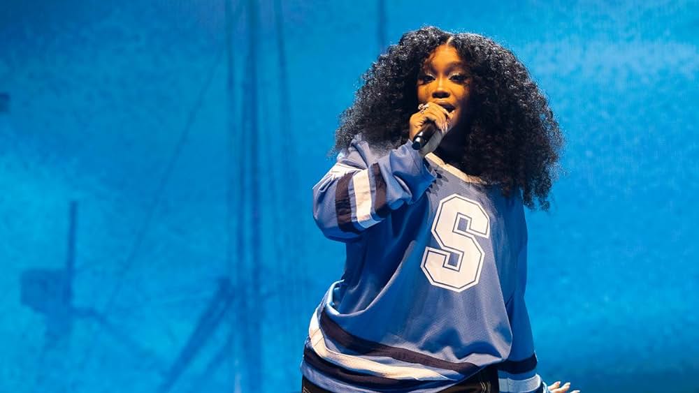 SZA Comes to Cher’s Defense After Grammys Mix-Up: ‘A Legend Was Speaking’
