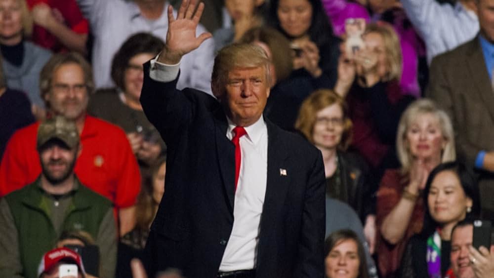 Trump Trolls Float Him as ‘Village Idiot’ Star of Turning Point Halftime Show