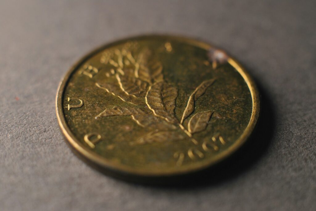 A close up of a coin on a table