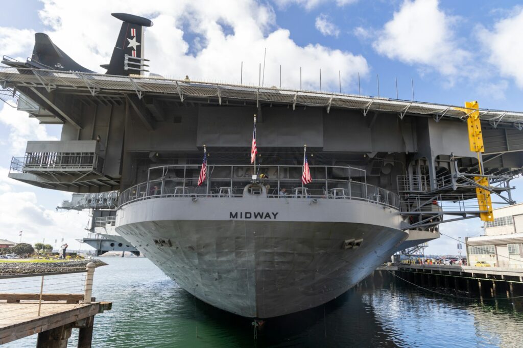 a large boat is docked at a dock