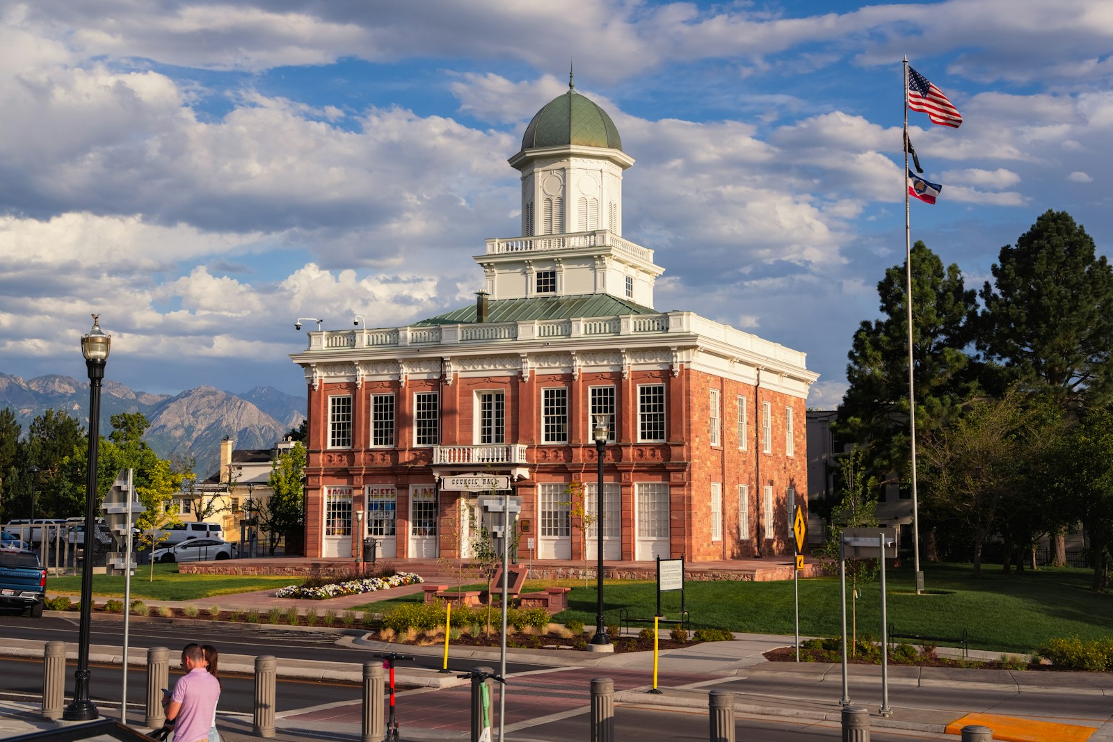 Historic brick building with a white domed tower