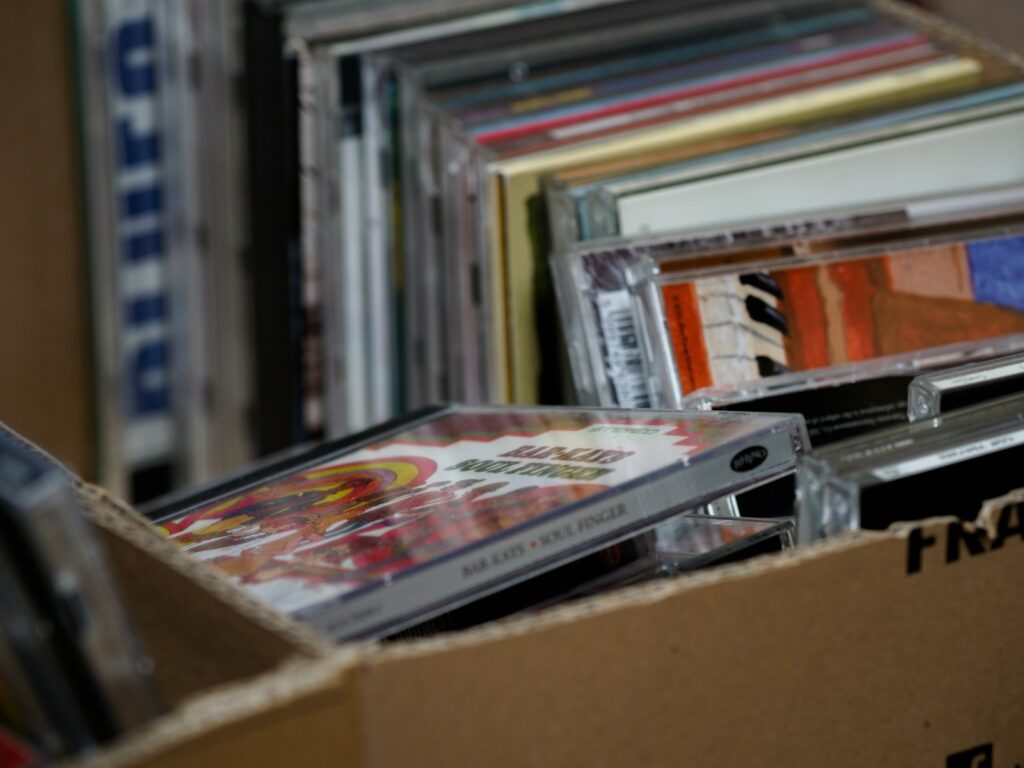 books in brown cardboard box