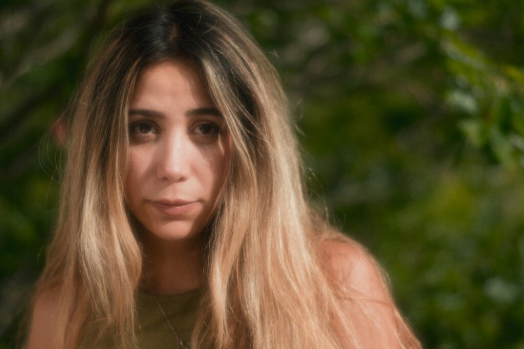 a close up of a person with long hair