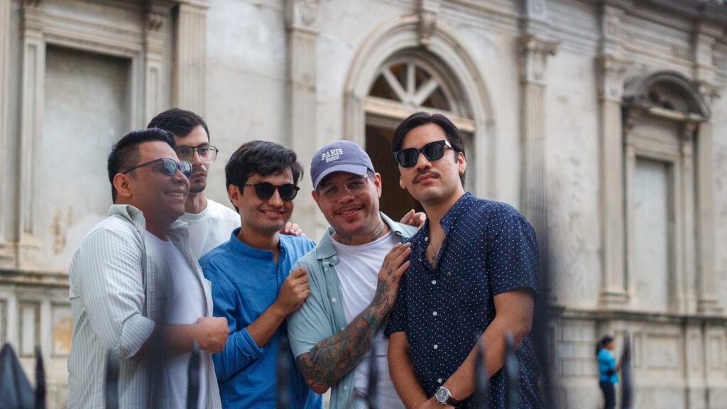 Group of friends posing for a picture outdoors