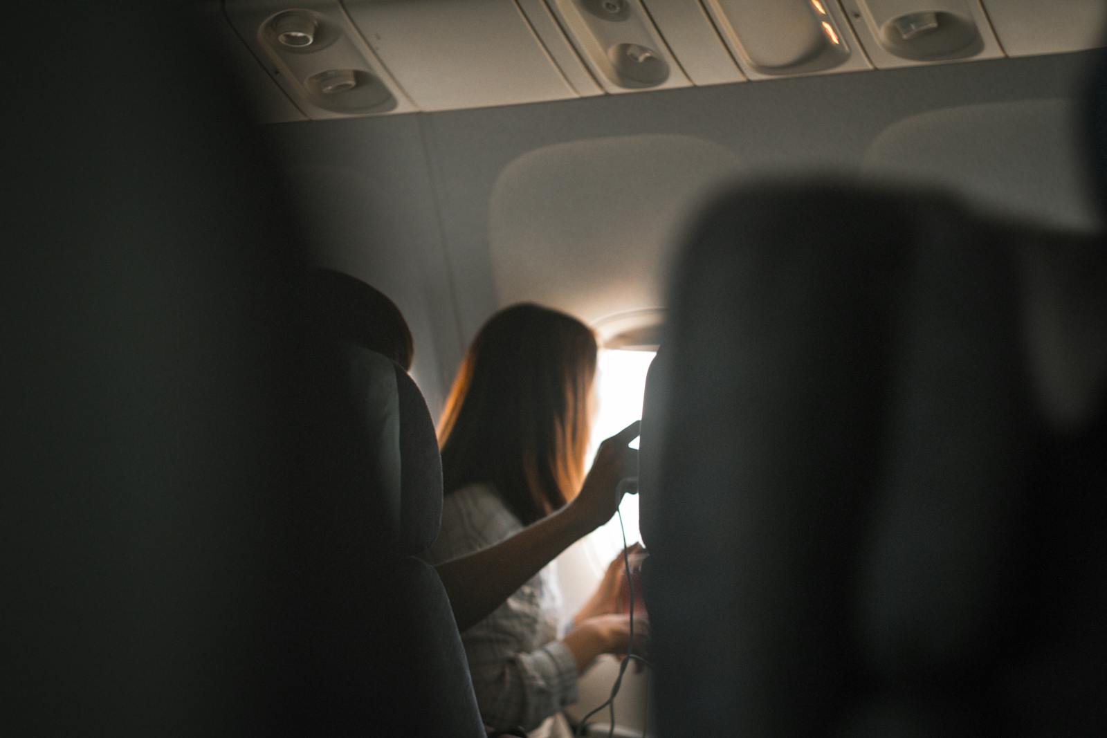 Mom on an 8-Hour Overnight Flight Marched the Aisle for Hours Banging Elbows and Snapping at Crew — Karma Hit When Her Daughter Lost a Passport at Landing