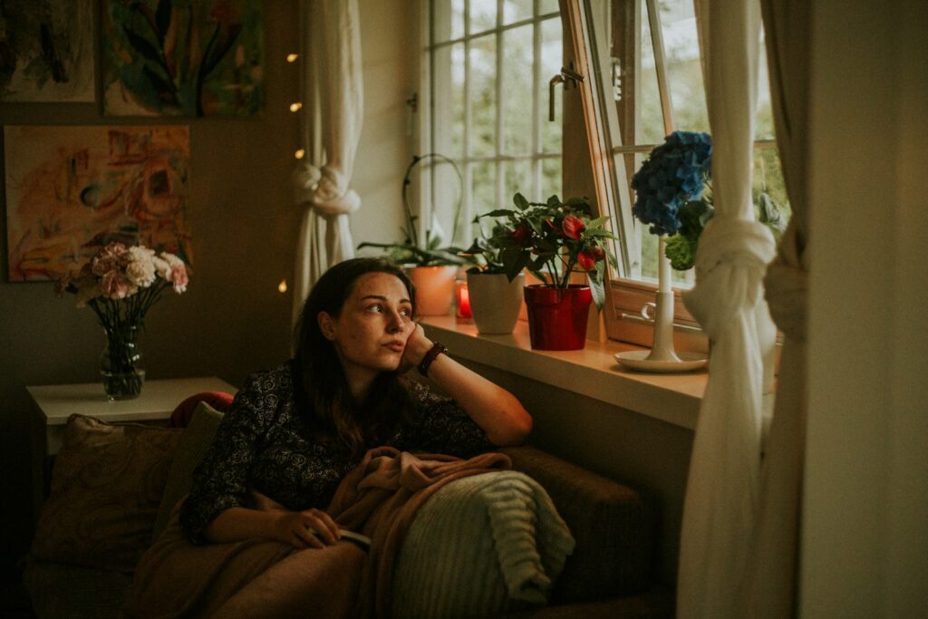 a person sitting on a couch