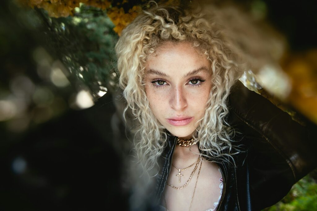 a woman with curly hair