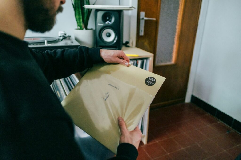 a man holding a piece of paper in his hands