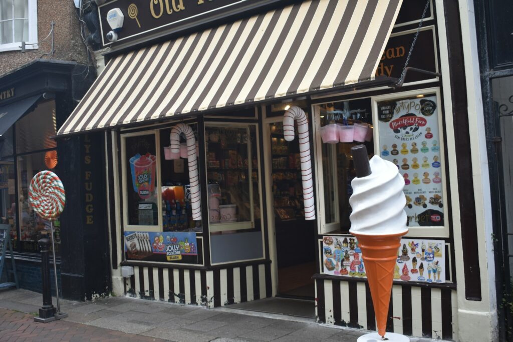 an ice cream shop on a city street
