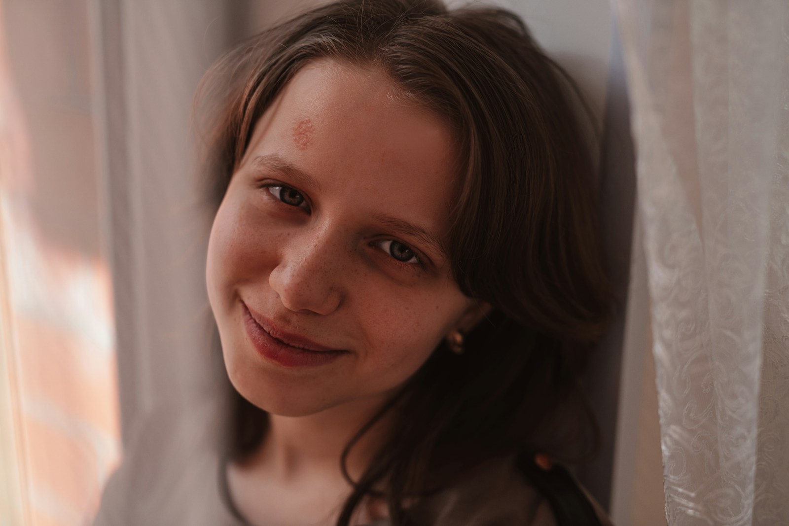 a young woman is posing for a picture