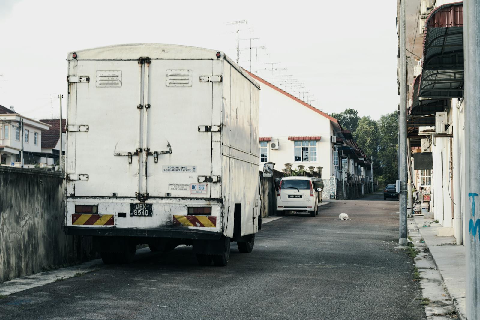 Neighbor Blocks A Public Sidewalk With His Truck And Trailer For Weeks, Then Police Finally Ticket Him After A Week Of Photo Evidence