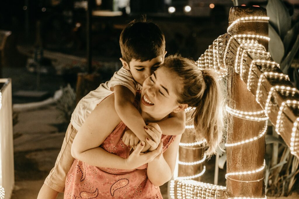 a boy and a girl hugging each other