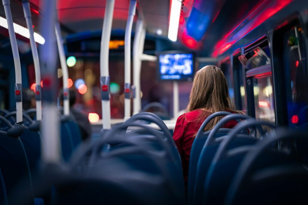 a person sitting on a bus
