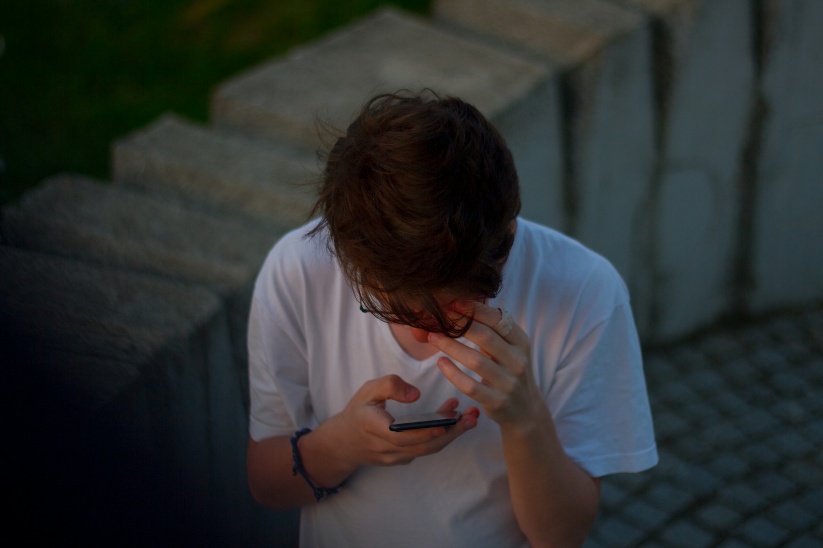 person looking at smartphone