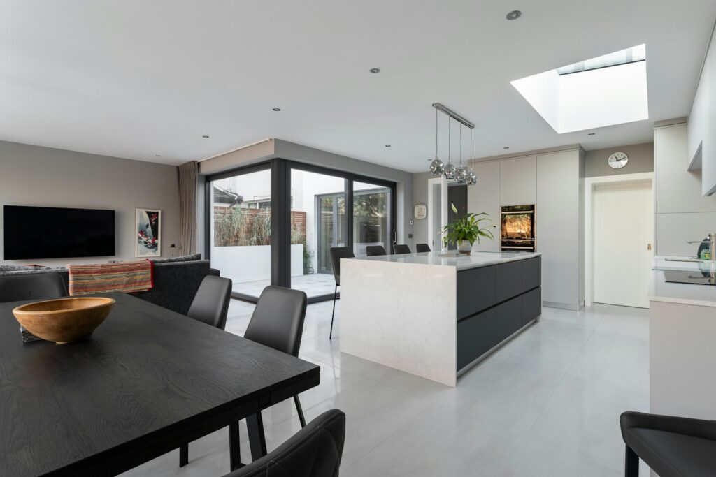 A warm kitchen with a dining table and tiled surfaces, the kind of handmade, artisan-detail look buyers are now searching for in listings