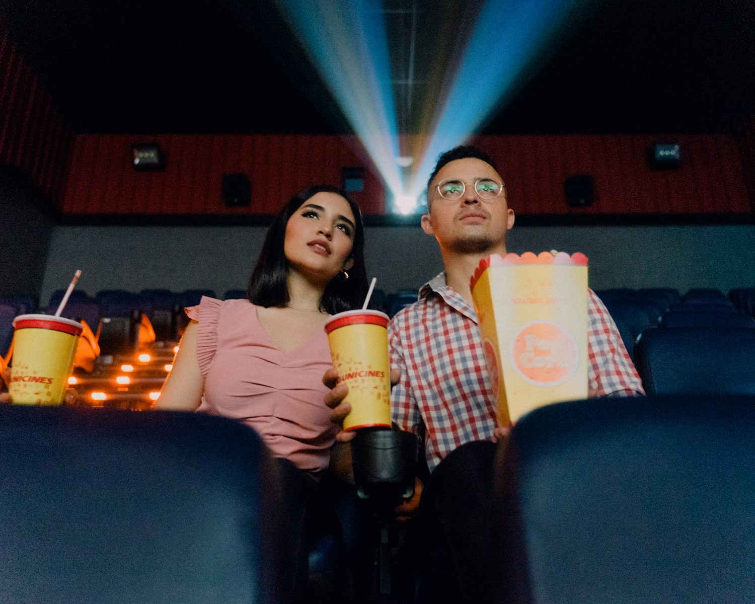 Couple Pays for Front-Row Balcony Seats at a Los Angeles Movie Theater—Then Discovers an Enormous Railing Blocks the Screen Unless They Sit Perfectly Straight and Lean Forward for the Entire Film