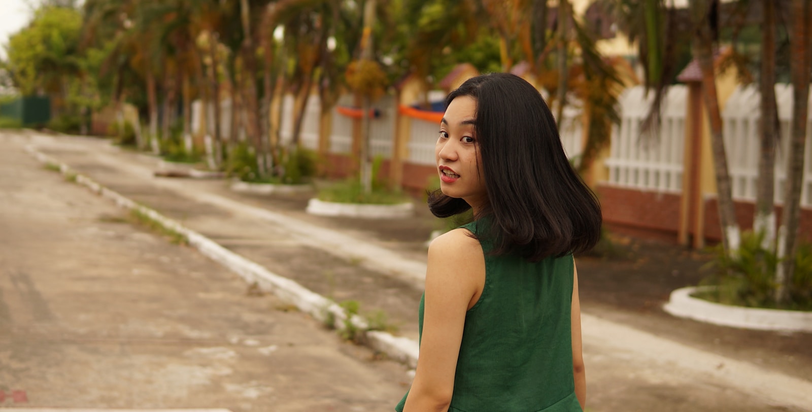 woman standing near tree