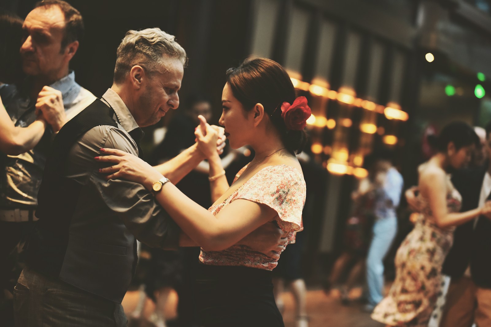 a couple of people that are dancing together