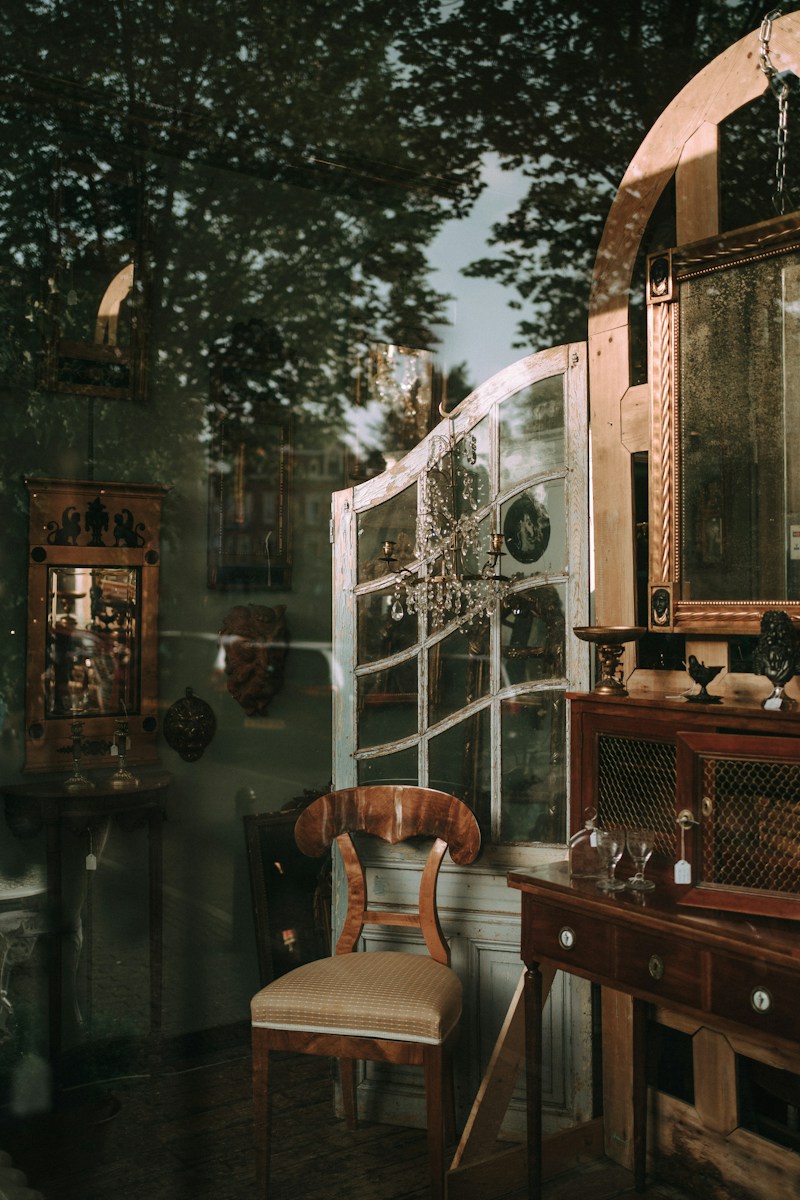 Antique shop interior with vintage furniture and mirrors