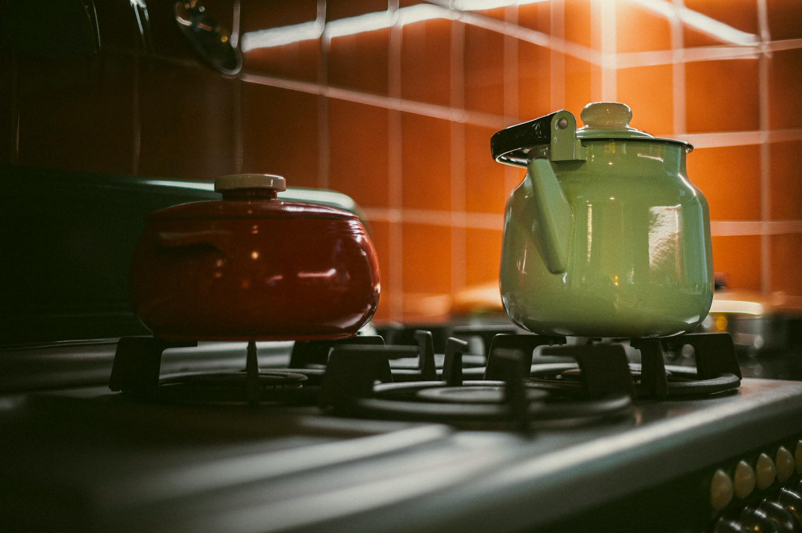 Two pots sit on a stove