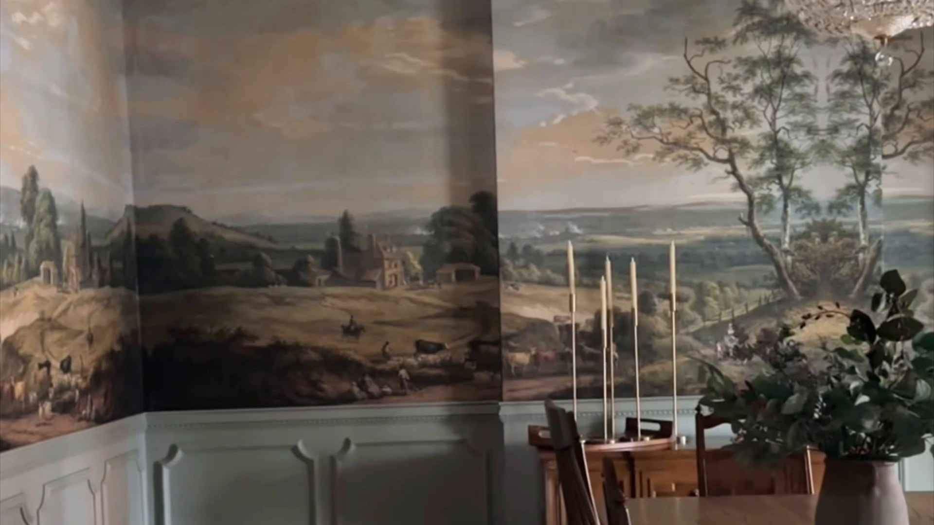 Dining room with scenic mural in a restored 1860s Italianate home