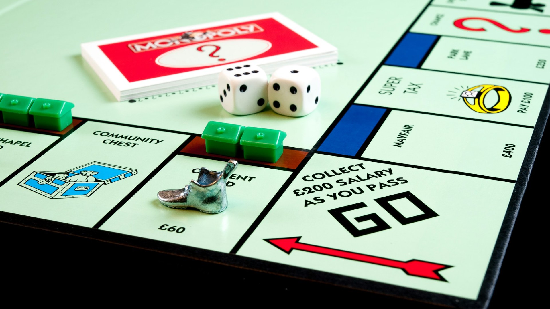 Monopoly board game with dice and Chance cards
