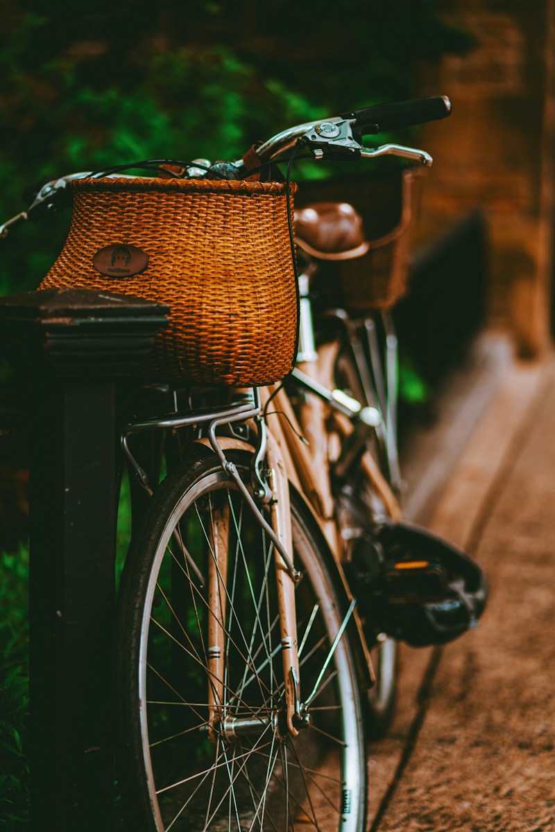 a bicycle with a basket on the back