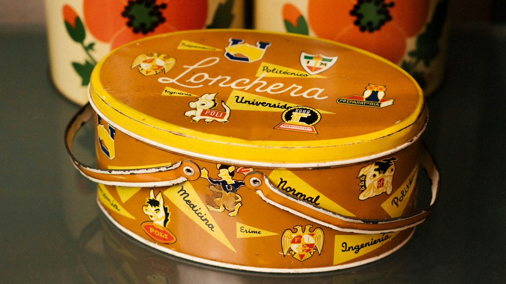 Unsplash photo by Gilbert Beltran showing an orange metal lunch box