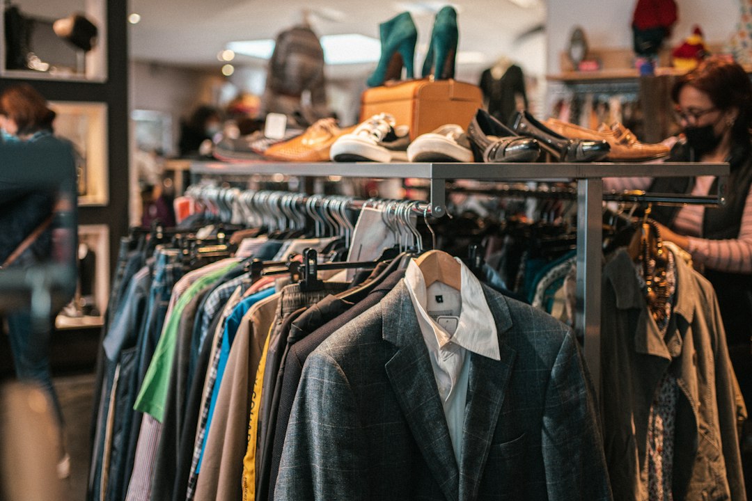 Rack of vintage secondhand clothes and shoes