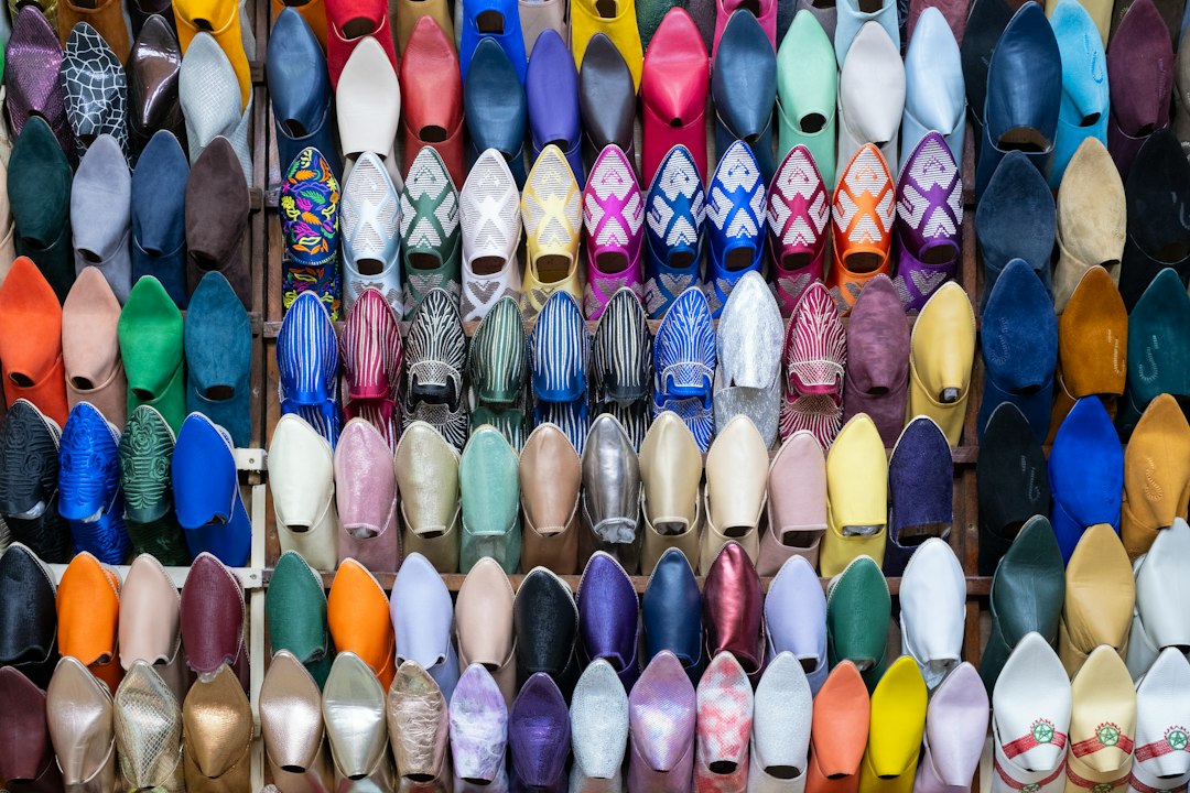 Collection of colorful shoes on a rack