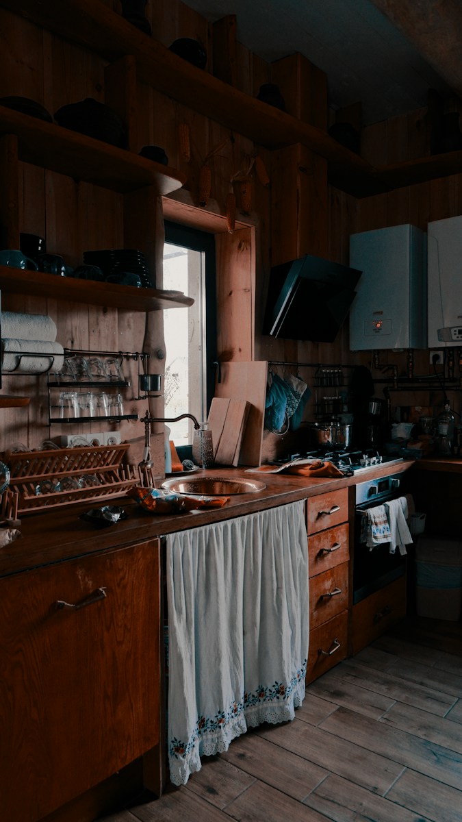 A 1930s Spanish Revival Kitchen Reveals Two Forgotten Built-In Features: a Soap Dispenser and a Trash Chute